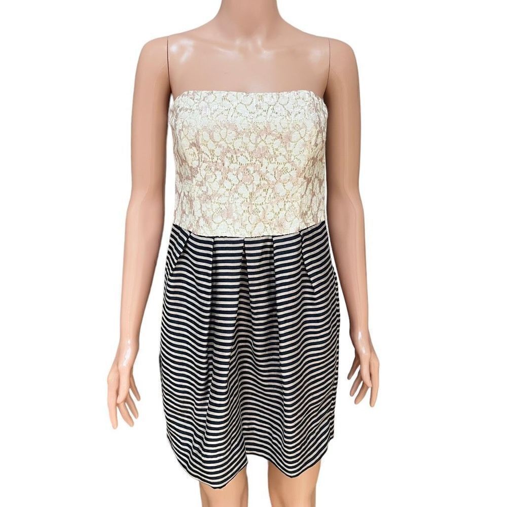 Rachael Roy dress has fitted bodice with pleated navy/tan striped skirt size 6